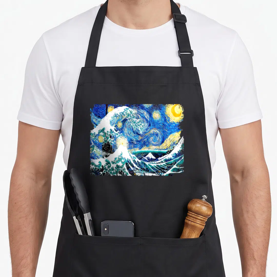 Wave van gogh apron - Fusion of Great Wave and Starry Night with blue yellow white swirls and mountain — shown on a black cotton canvas apron against a white background