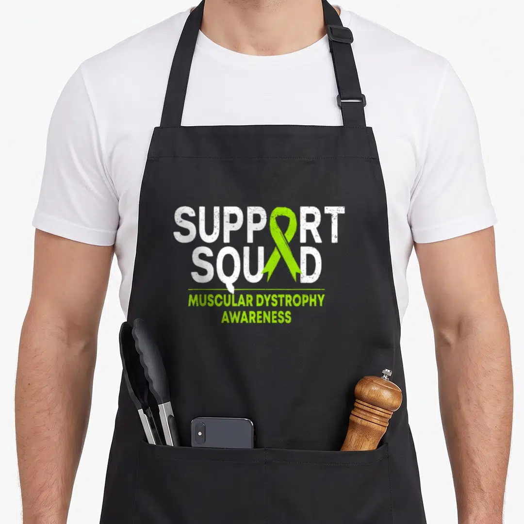 Dystrophy ribbon apron - Distressed white Support Squad text with vertical lime green ribbon and Muscular Dystrophy — shown on a black cotton canvas apron against a white background