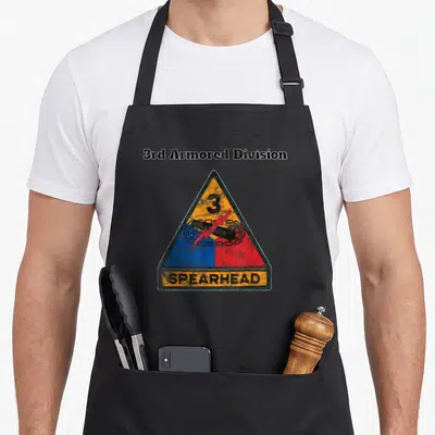 Griffin military apron - Distressed 3rd Armored Division Spearhead patch with tank and lightning bolt in yellow blue — shown on a black cotton canvas apron against a white background
