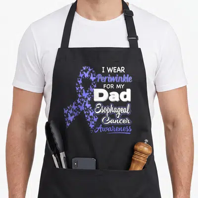 Periwinkle madagascar apron - Butterfly awareness ribbon and I wear periwinkle for my dad text in blue and white — shown on a black cotton canvas apron against a white background