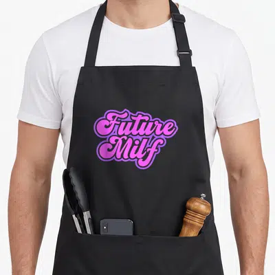 Future training apron - Pink script text Future Milf with purple outline stacked in two lines — shown on a black cotton canvas apron against a white background