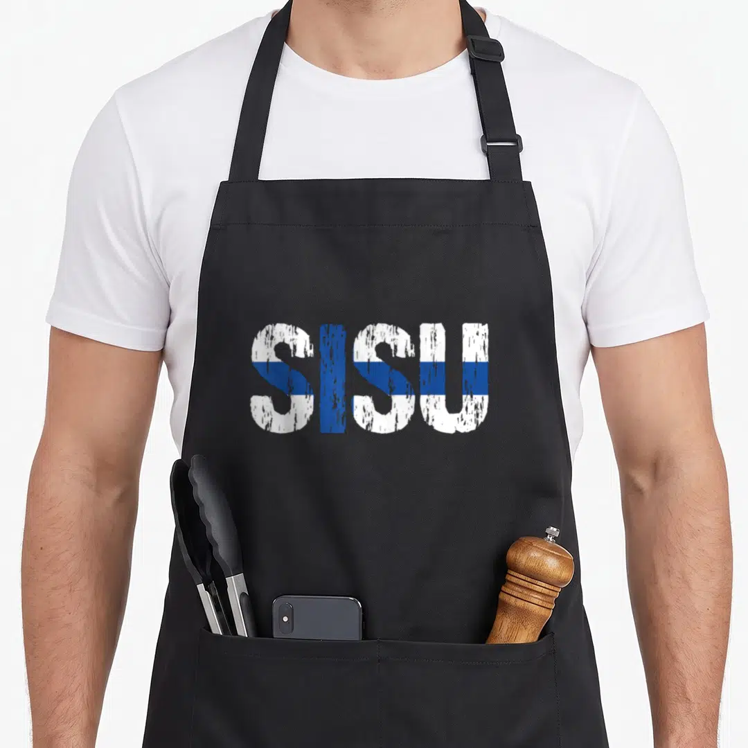 Finnish distressed apron - SISU text in white and blue distressed font resembling a flag pattern — shown on a black cotton canvas apron against a white background
