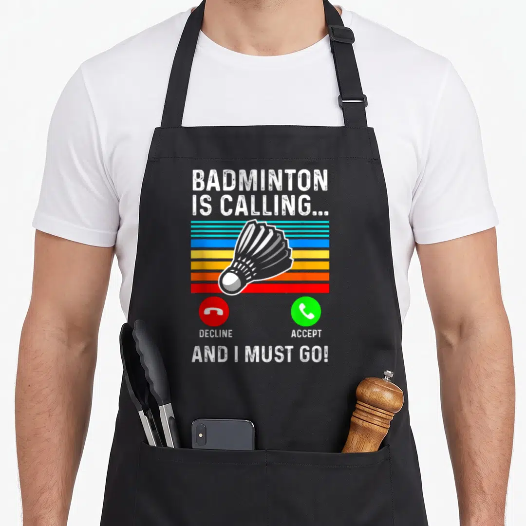 Badminton pickleball apron - Retro shuttlecock over colored stripes with red decline and green accept phone buttons — shown on a black cotton canvas apron against a white background