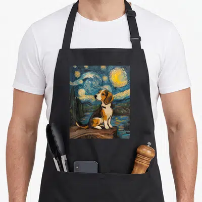 Beagle van gogh apron - Beagle sitting on rock under swirling blue starry night sky in watercolor style — shown on a black cotton canvas apron against a white background