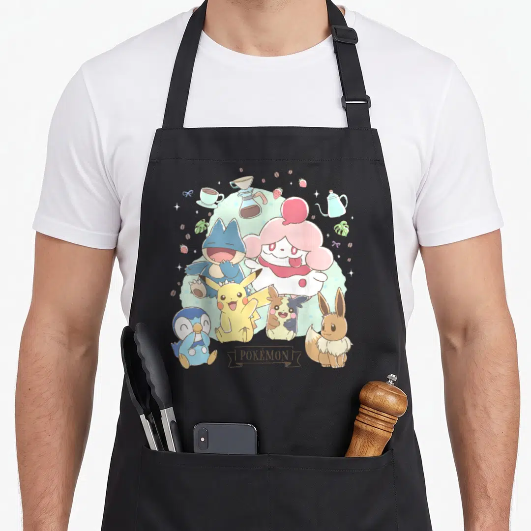 Cafe eevee apron - Cartoon Pokémon group with coffee cups and strawberries over light blue blob — shown on a black cotton canvas apron against a white background