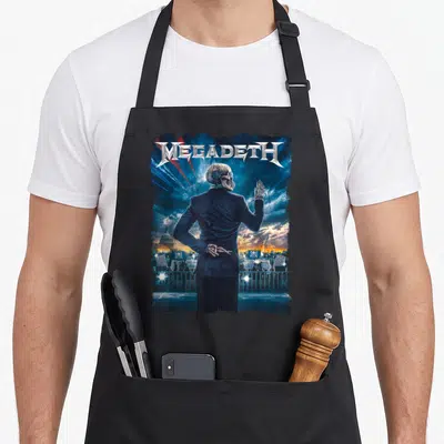 Megadeth rally girl apron - Skeleton in suit facing crowd with Megadeth text and rally signs — shown on a black cotton canvas apron against a white background