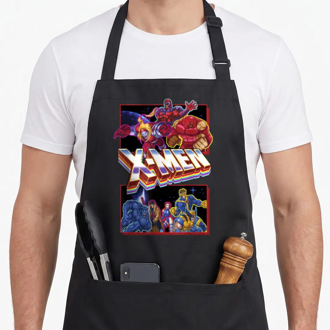 Panel video game apron - X-MEN pixel art with villains top heroes bottom rainbow 3D text two front pockets — shown on a black cotton canvas apron against a white background