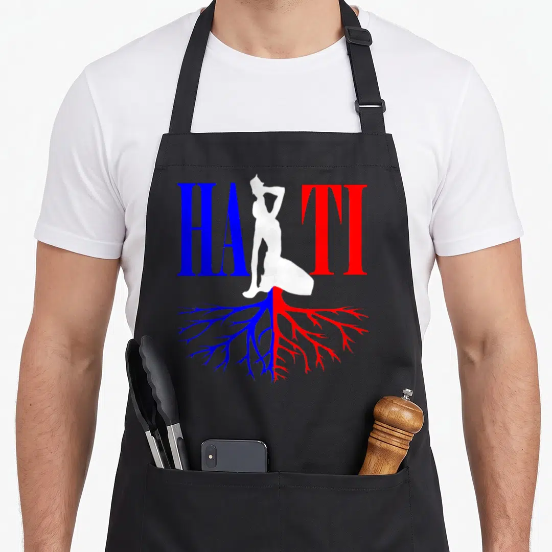 Independence pride apron - HAITI text with woman silhouette and blue red roots — shown on a black cotton canvas apron against a white background