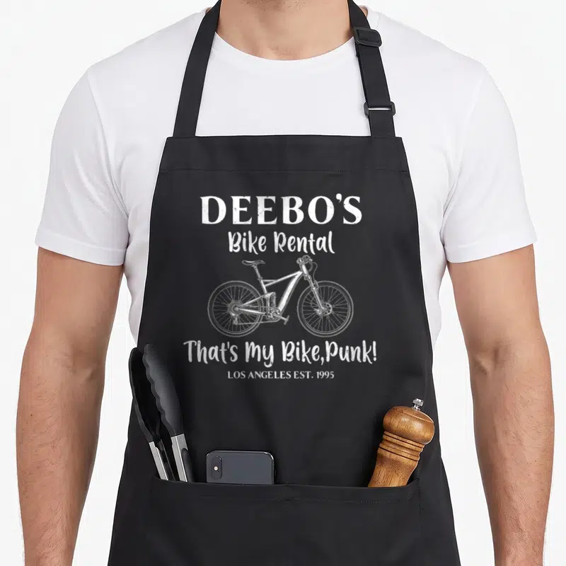 Deebo bike apron - White distressed bicycle and rental text on grey background — shown on a black cotton canvas apron against a white background