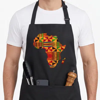 Africa african apron - Map of Africa filled with colorful geometric Kente cloth patterns on a black background — shown on a black cotton canvas apron against a white background