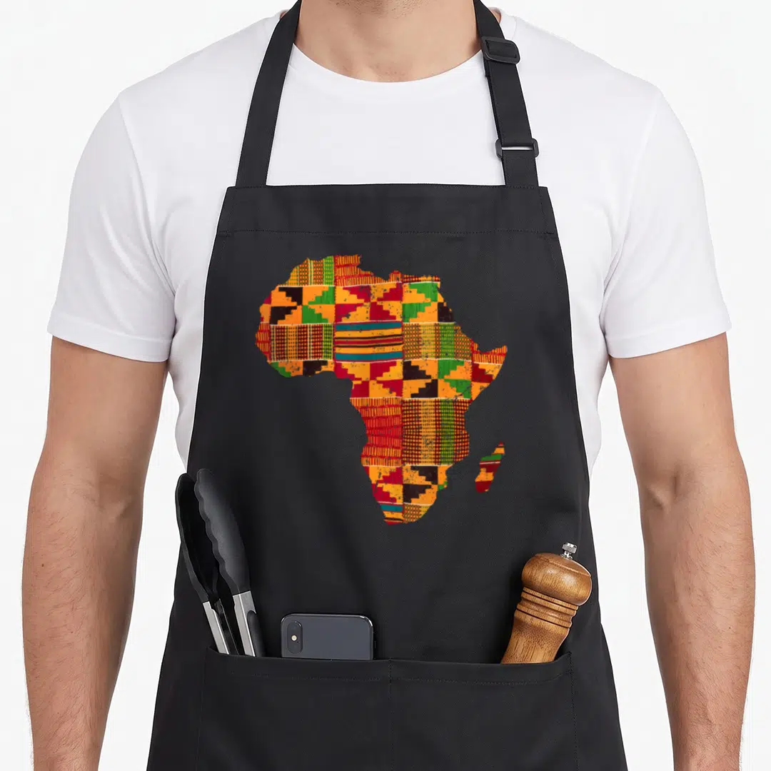 Africa african apron - Map of Africa filled with colorful geometric Kente cloth patterns on a black background — shown on a black cotton canvas apron against a white background