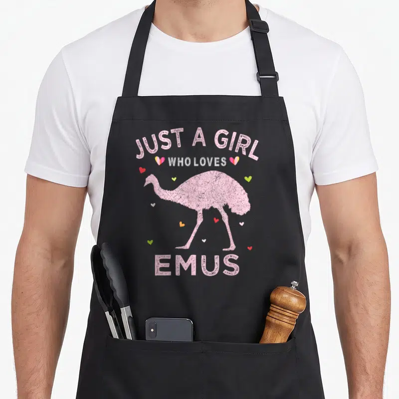 Emus bird apron - Distressed pink emu silhouette with hearts and text JUST A GIRL WHO LOVES EMUS — shown on a black cotton canvas apron against a white background