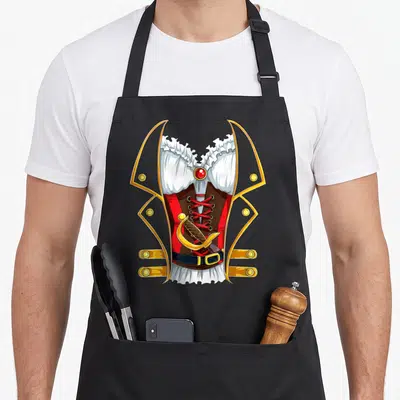 Jolly roger halloween apron - Cartoon pirate outfit with gold coat red corset and cutlass — shown on a black cotton canvas apron against a white background