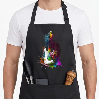 Musician crew apron - White electric guitar over blue purple yellow red paint splashes — shown on a black cotton canvas apron against a white background