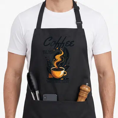 Neat coffee apron - Orange coffee cup with dark blue leaves and text reading Coffee Black Bourbon Neat — shown on a black cotton canvas apron against a white background