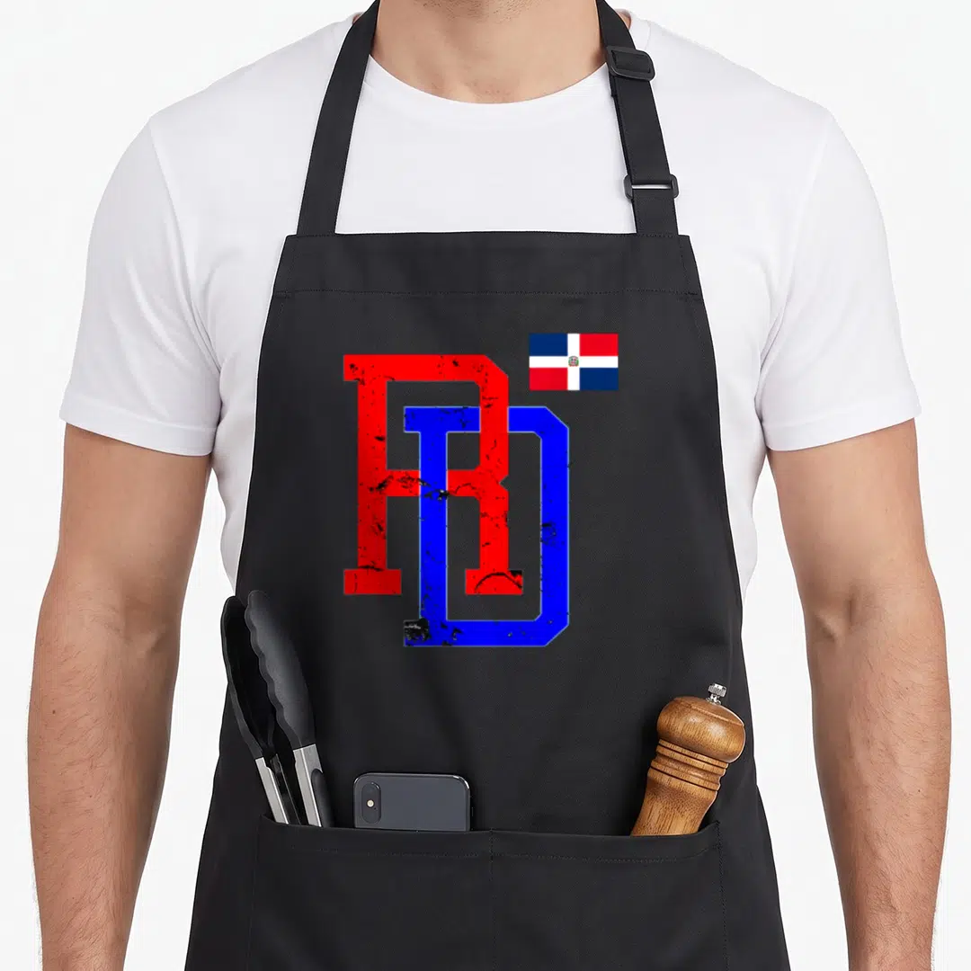 Republic pride apron - Red R and blue D letters overlapping with a small Dominican Republic flag in the corner — shown on a black cotton canvas apron against a white background