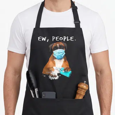 Mask boxer dog apron - Brown boxer dog in blue mask holding blue sanitizer bottle with white text EW PEOPLE above — shown on a black cotton canvas apron against a white background