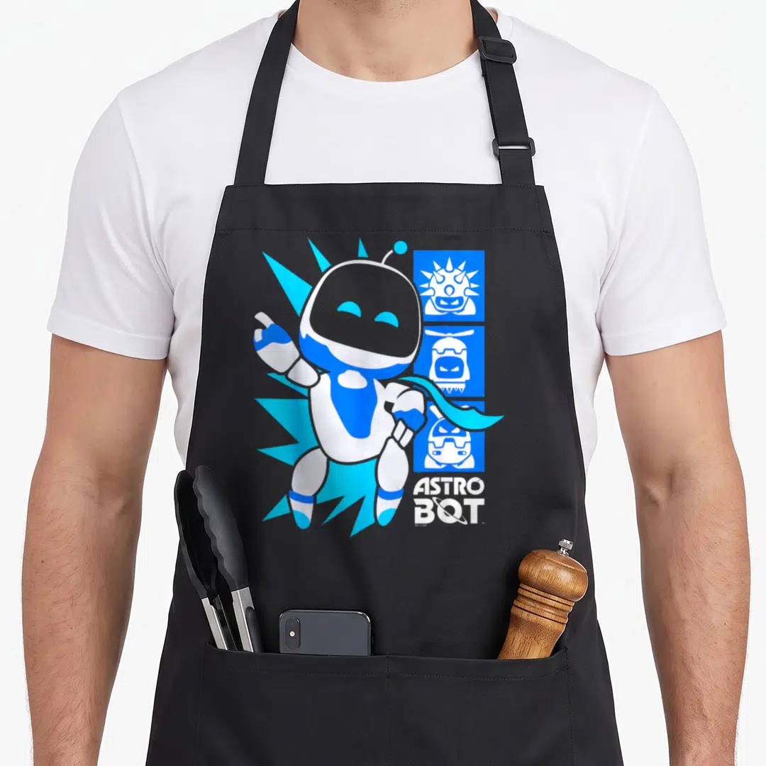 Astro video game apron - Blue and white Astro Bot with three stacked enemy icons and logo text — shown on a black cotton canvas apron against a white background