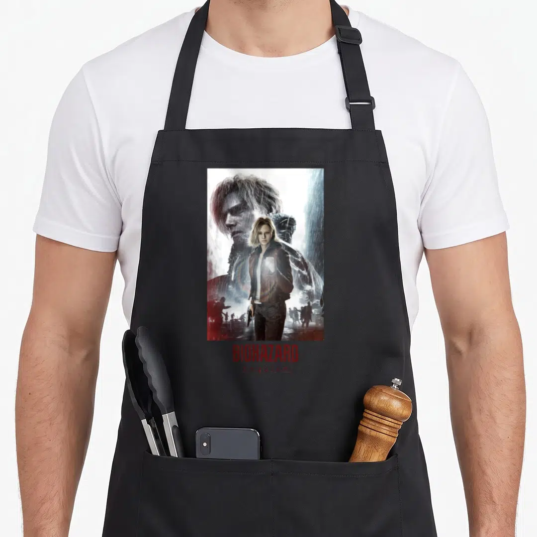 Requiem grace apron - Woman in brown jacket and man face in rain with red BIOHAZARD requiem text below — shown on a black cotton canvas apron against a white background