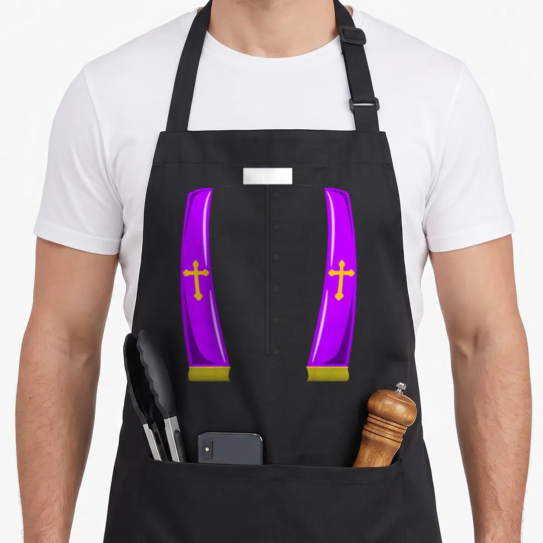 Priest halloween apron - Grey clerical shirt with purple stoles and yellow cross details — shown on a black cotton canvas apron against a white background