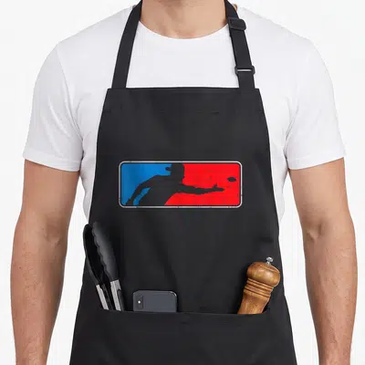 Cornhole game aprons - Grey football player silhouette and ball inside white frame with vertical blue and red — shown on a black cotton canvas apron against a white background
