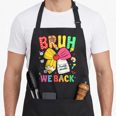 4th bruh grade apron - Cartoon pencil and notebook tied with bow surrounded by school supplies and Fourth Grade text — shown on a black cotton canvas apron against a white background