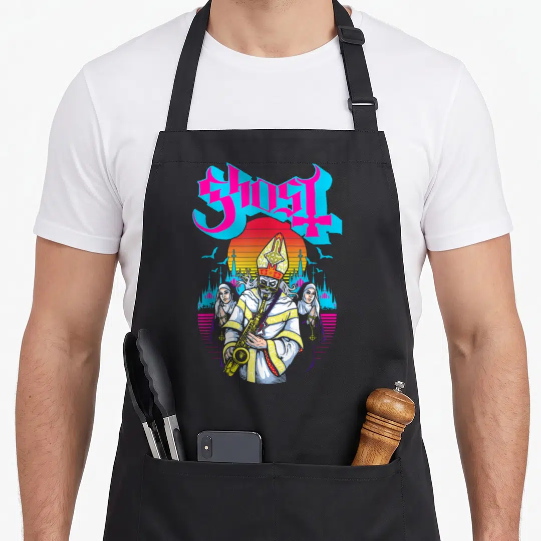 Miasma ghost apron - GHOST text over cartoon pope playing sax with two nuns and red sun — shown on a black cotton canvas apron against a white background