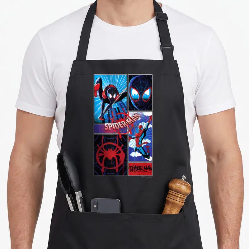 Peter spider apron - Comic grid with Spider-Man swinging and SPIDER-MAN INTO THE SPIDERVERSE text overlay in red blue — shown on a black cotton canvas apron against a white background