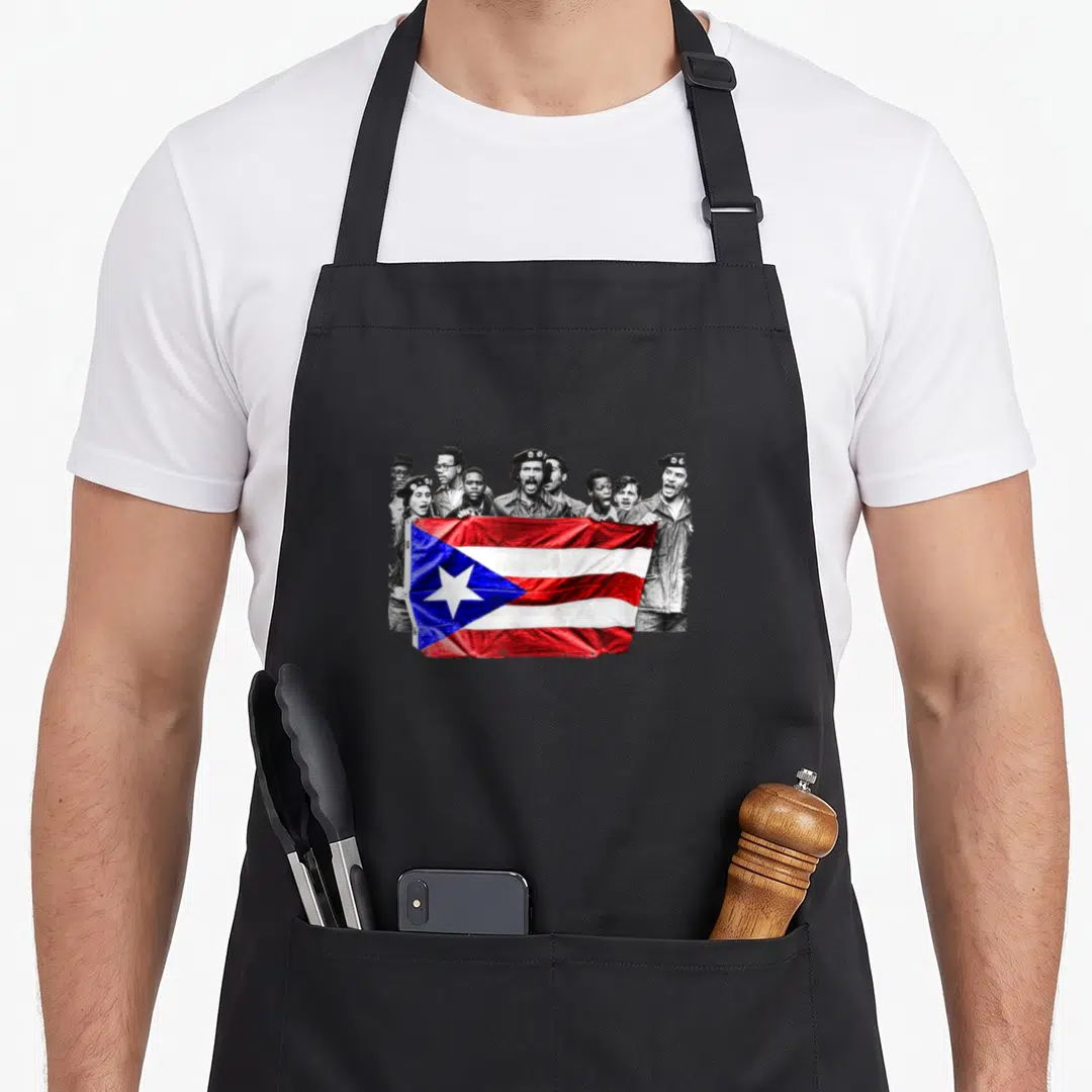 Young puerto girl apron - Grayscale group holding colorful red white blue Puerto Rican flag — shown on a black cotton canvas apron against a white background