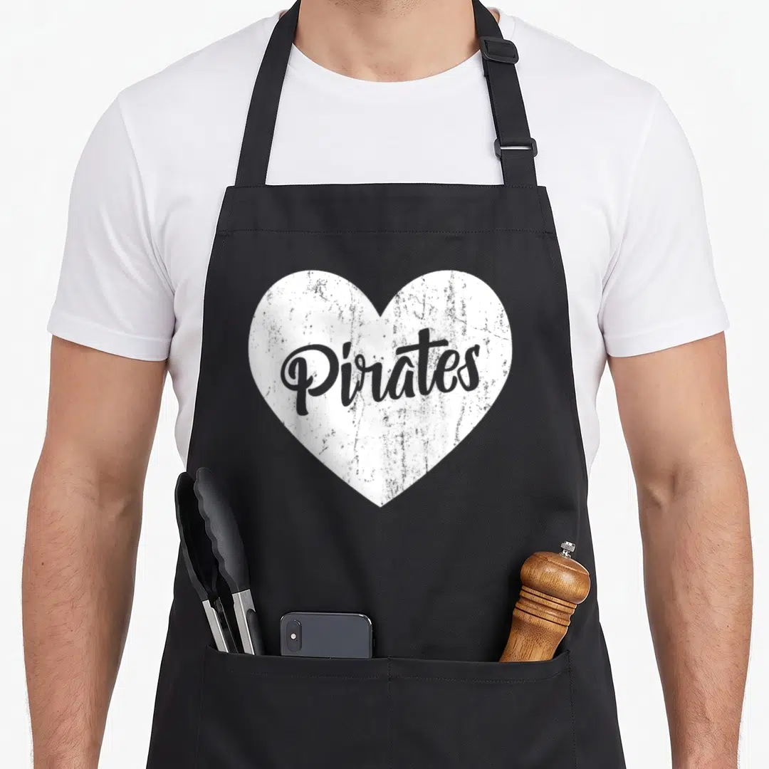 Pirate mascot apron - White distressed heart with grey Pirates script text — shown on a black cotton canvas apron against a white background