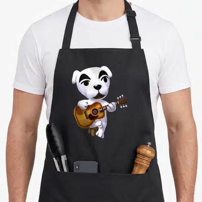 Slider crossover apron - White cartoon dog sitting on stool playing brown acoustic guitar — shown on a black cotton canvas apron against a white background