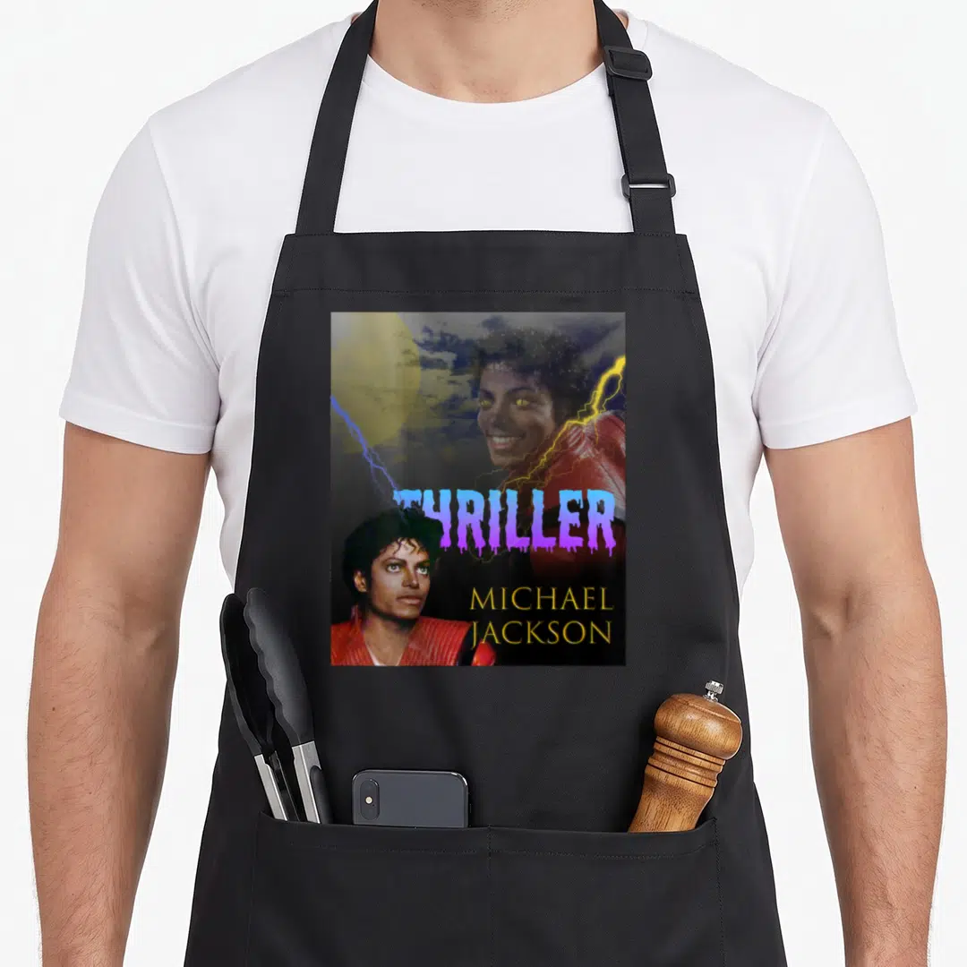 Jackson thriller michaels apron - Michael Jackson portrait with purple dripping Thriller text, yellow name — shown on a black cotton canvas apron against a white background