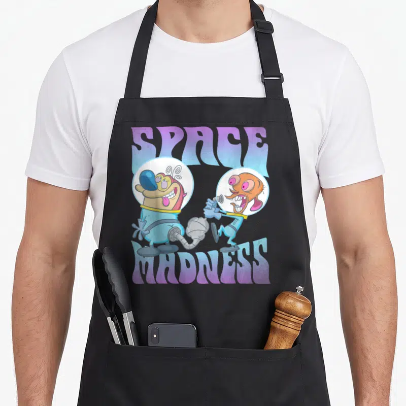 Ren cosmonaut apron - Two cartoon aliens in space suits connected by a hose under SPACE MADNESS text — shown on a black cotton canvas apron against a white background