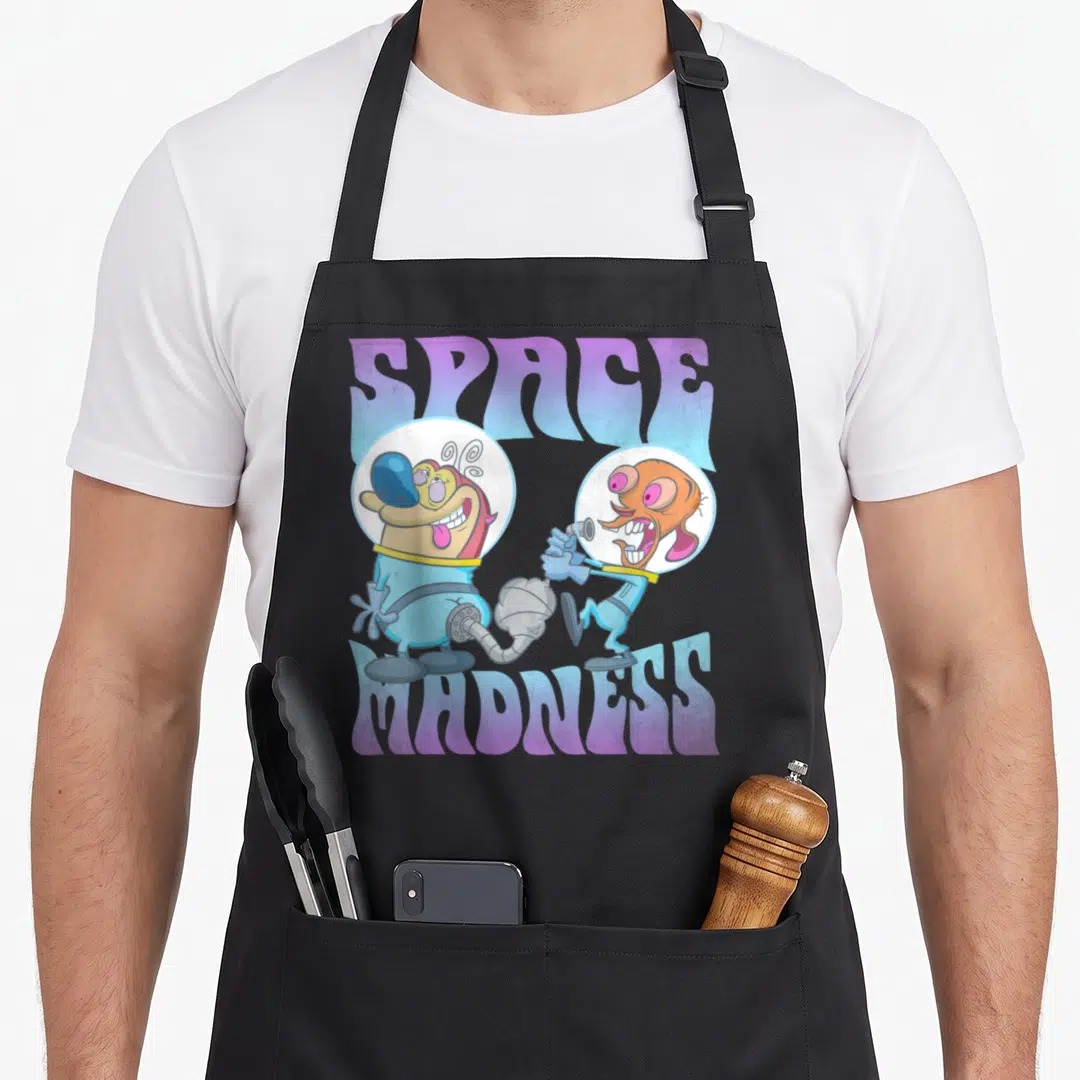 Ren cosmonaut apron - Two cartoon aliens in space suits connected by a hose under SPACE MADNESS text — shown on a black cotton canvas apron against a white background