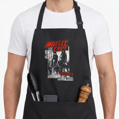 Tley hollywood e.a apron - Mötley Crüe band photo with Bad Boys of Hollywood text and pentagram in distressed red — shown on a black cotton canvas apron against a white background