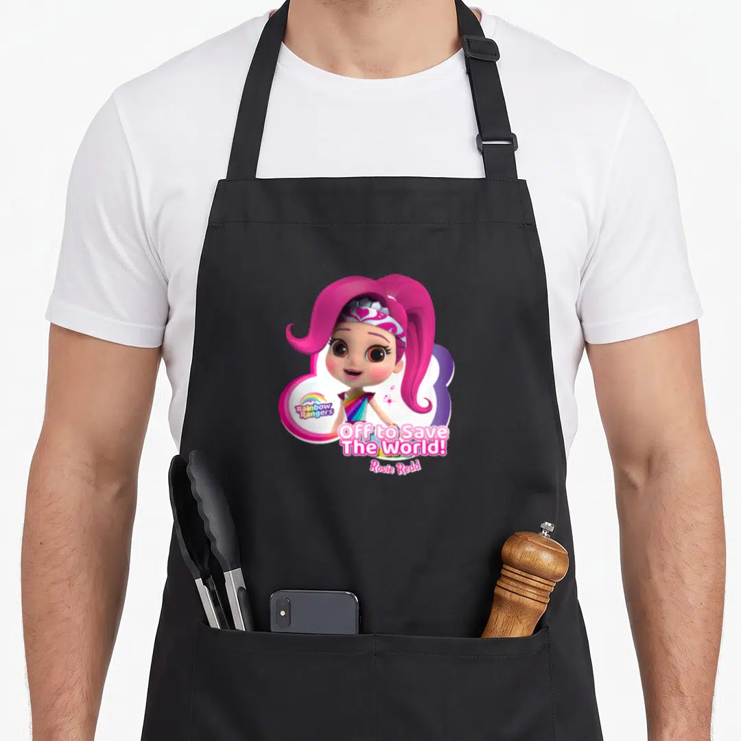 Ranger rainbow apron - Cartoon girl Rosie Redd with rainbow logo and Off to Save The World text — shown on a black cotton canvas apron against a white background