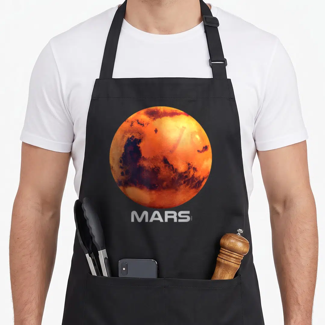 Mar space planets apron - Realistic orange and red planet Mars centered above white MARS text — shown on a black cotton canvas apron against a white background