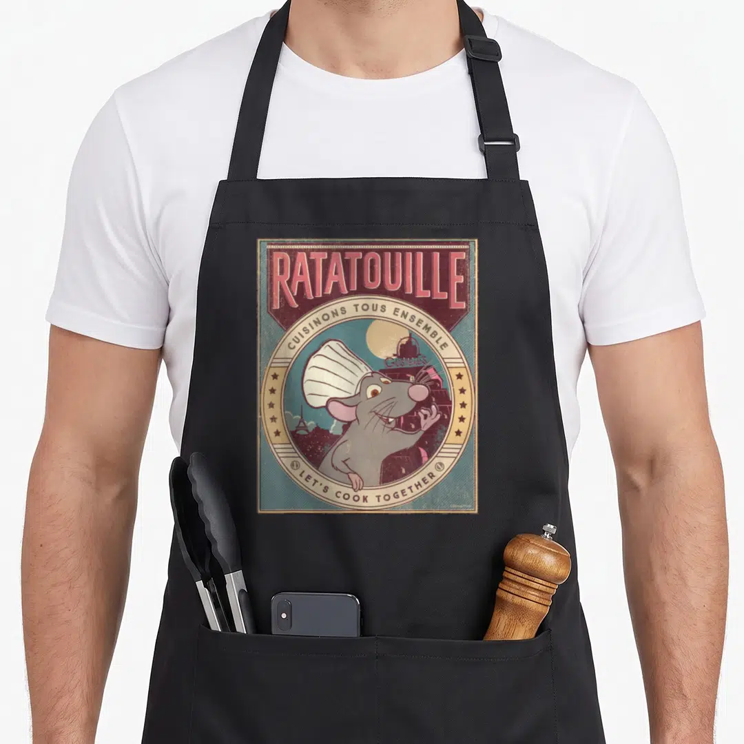 Together remy ratatouille apron - Retro poster style grey rat chef hat Paris skyline red beige blue text — shown on a black cotton canvas apron against a white background