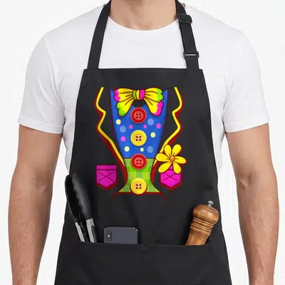 Circus clown aprons - Cartoon dress with blue bodice, yellow bow, red buttons, pink pockets, and yellow flower overlay — shown on a black cotton canvas apron against a white background