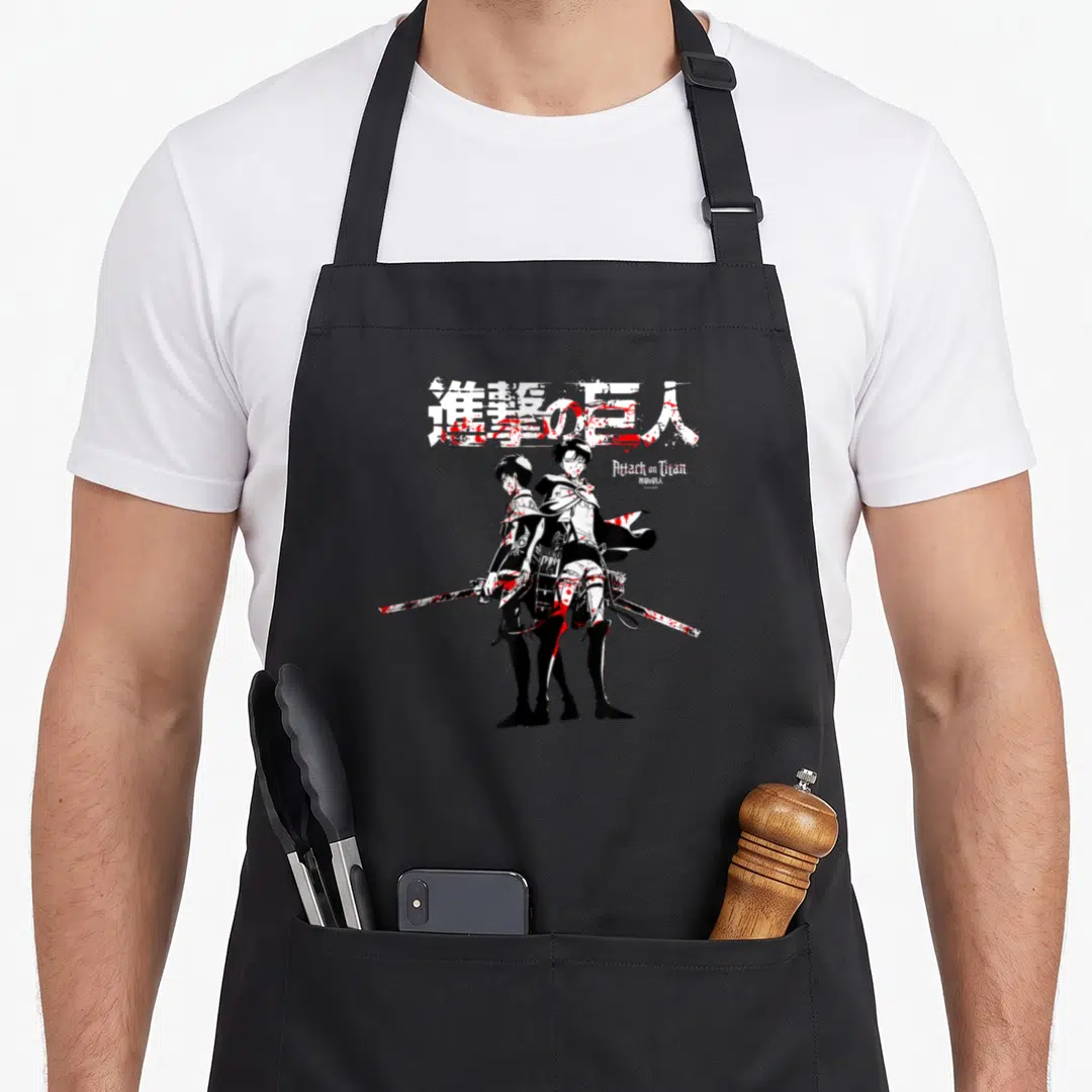 Eren anime apron - Black white red kanji and two sword characters with blood splatters — shown on a black cotton canvas apron against a white background