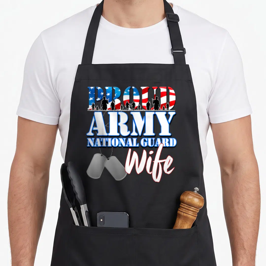 Guard personalized dog apron - PROUD ARMY NATIONAL GUARD Wife text with flag pattern, soldier silhouettes, and two — shown on a black cotton canvas apron against a white background