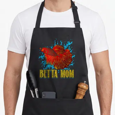 Fighting fish apron - Red betta fish over blue splashes with BETTA MOM text — shown on a black cotton canvas apron against a white background