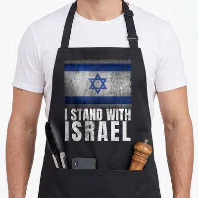 Heritage jewish aprons - Distressed blue and white Israel flag above white I Stand With Israel text — shown on a black cotton canvas apron against a white background