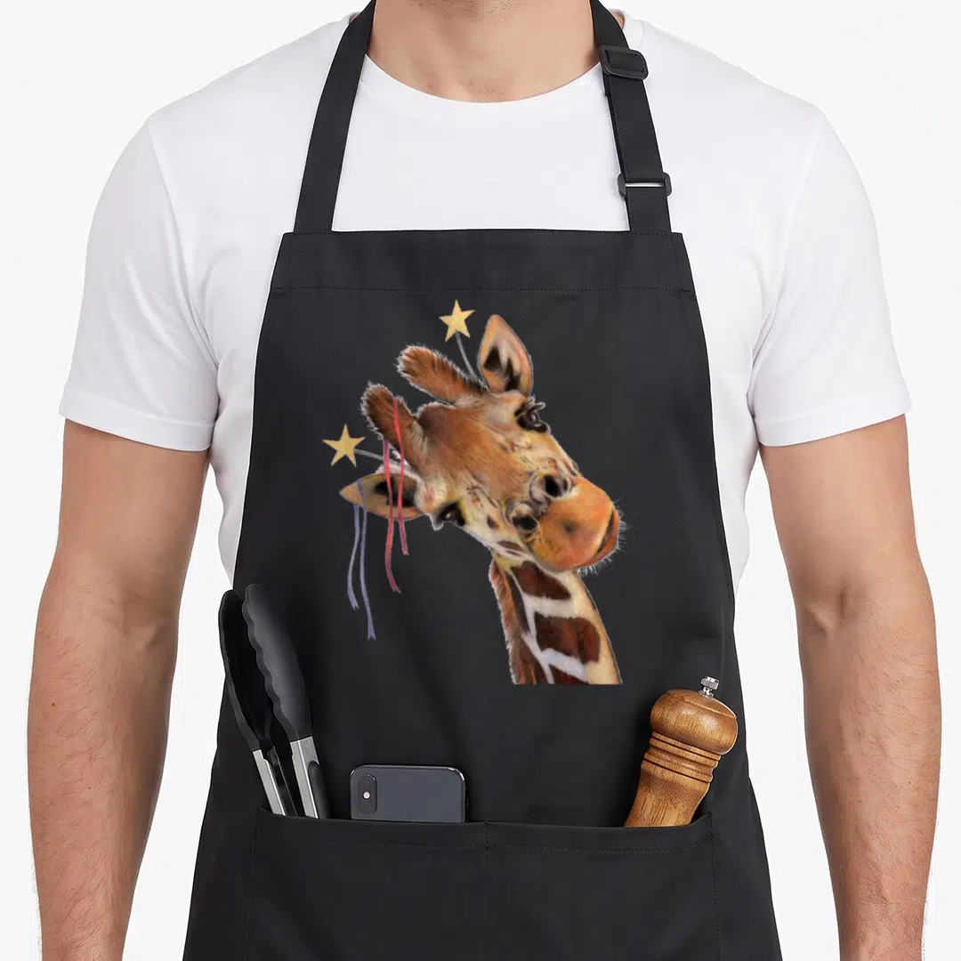 Drawing giraffe apron - Realistic giraffe head with two stars on wires and hanging red and purple ribbons — shown on a black cotton canvas apron against a white background