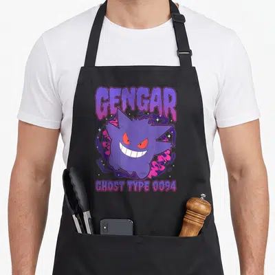 Pok spooky apron - Gengar ghost type 0094 purple cartoon character with smoke and stars — shown on a black cotton canvas apron against a white background