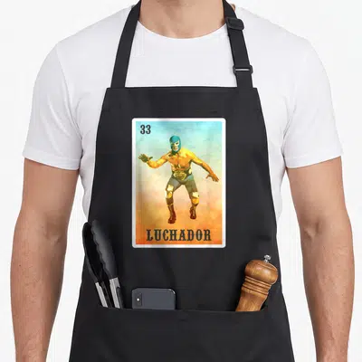 Wrestler mexico apron - Luchador 33 watercolor print with blue orange background and dark grey text — shown on a black cotton canvas apron against a white background