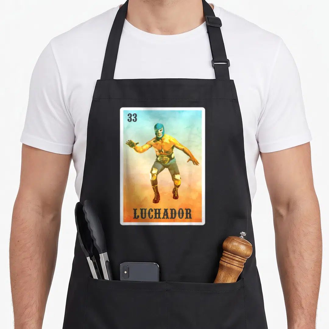 Wrestler mexico apron - Luchador 33 watercolor print with blue orange background and dark grey text — shown on a black cotton canvas apron against a white background