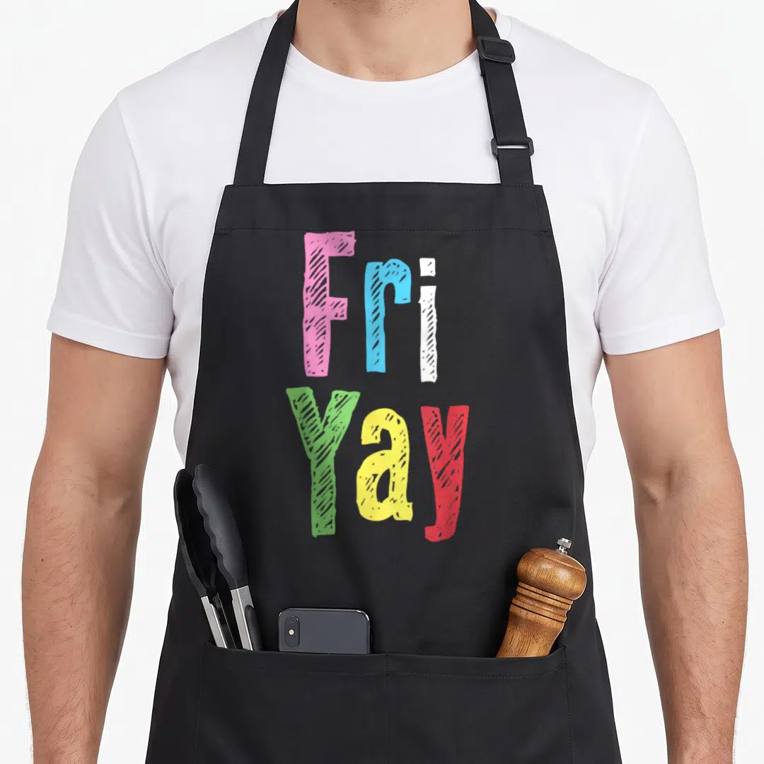 Weekend friday teacher apron - Stacked colorful text reading Fri Yay in pink blue white green yellow and red chalk — shown on a black cotton canvas apron against a white background