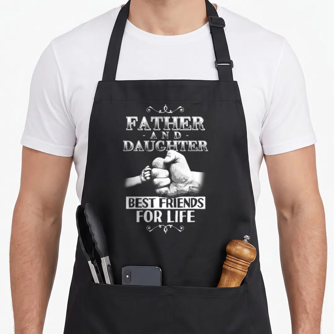 Friend father daughter aprons - Distressed white text reading Father And Daughter Best Friends For Life above hands — shown on a black cotton canvas apron against a white background