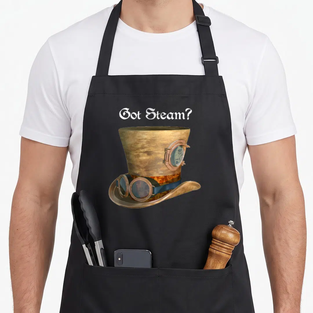 Steam goggles and apron - Got Steam text above a brown steampunk top hat with bronze goggles — shown on a black cotton canvas apron against a white background